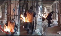 Dondurucu Soğukta Ateş Yanan Tenekeyle İşine Devam Etti