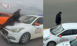 Sürücü Kursu Eğitmeni Tartıştığı Kişiyi Kaput Üzerinde Sürükledi